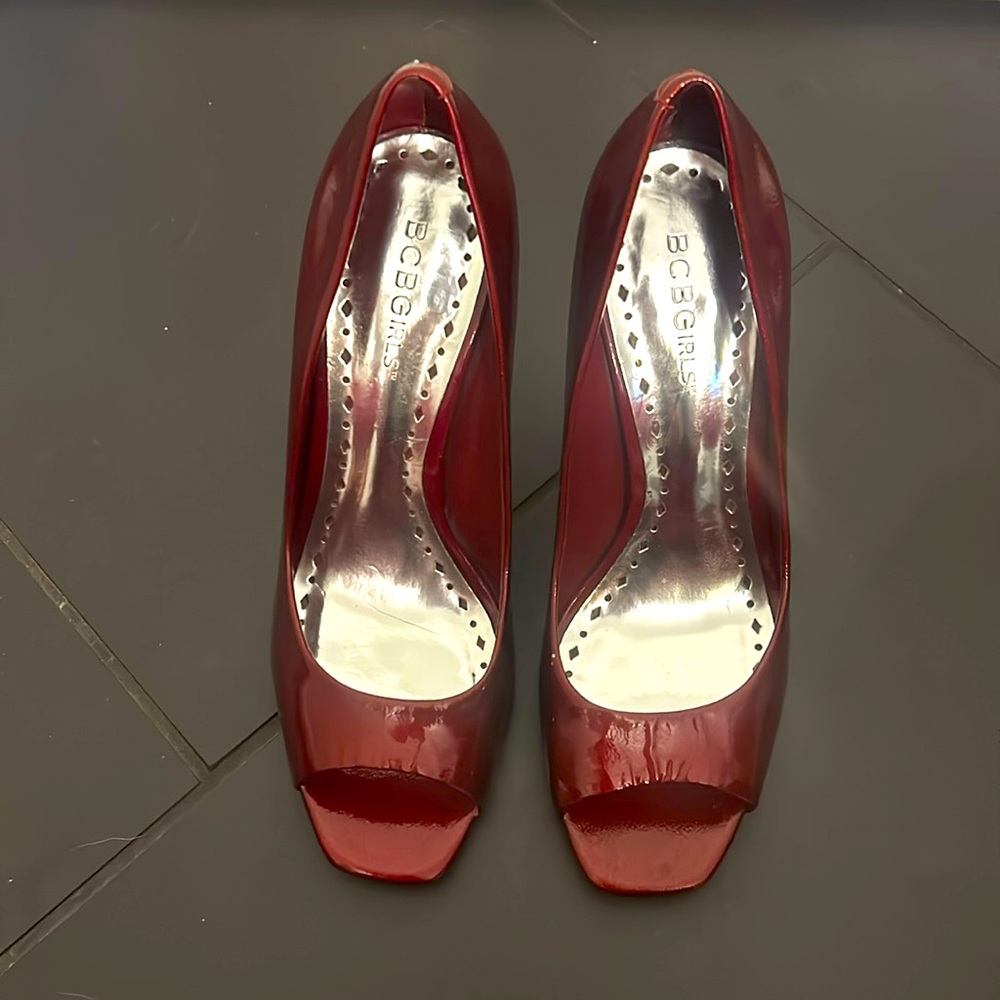 BCBG heels. Deep red color with patten finish. Size 7.5.